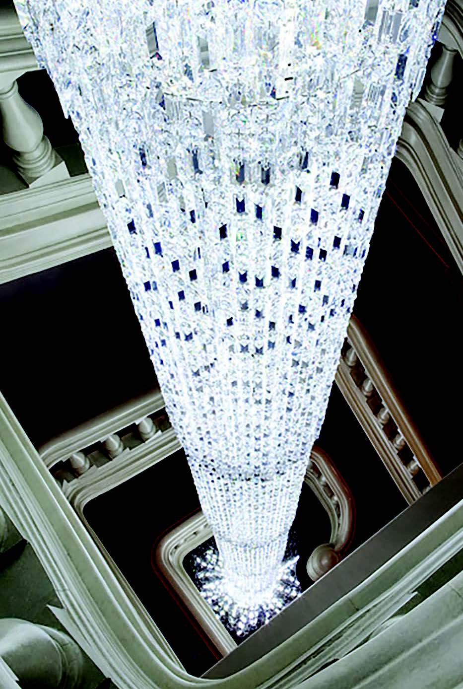 The Stanford White staircase and Swarovski Crystal chandelier at Gramercy House.